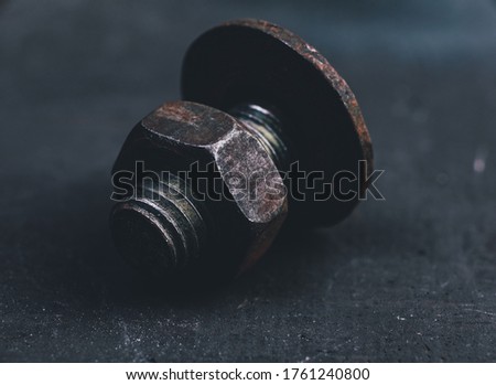 bolt and nut on a dark background