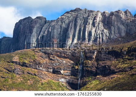 Beautiful mountain valley waterfall and granite rock formations of Andringitra national park Madagascar Royalty-Free Stock Photo #1761255830