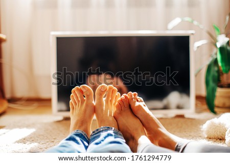 TV, television watching. Couple in love. Couple in love. 