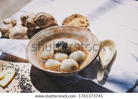 Glutinous Rice Balls in Sweet Ginger Soup chinese dessert. Royalty-Free Stock Photo #1761373745