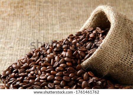 Canvas Sack with Scattered Coffee Beans