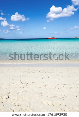 Boat on the beautiful sea of the Ira beach in Porto Rotondo, Olbia, Costa Smeralda - Sardinia