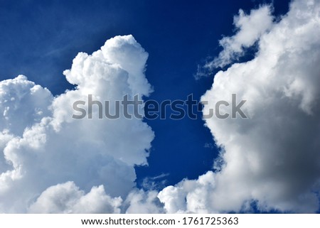 White and dark clouds in the blue sky, is a rainy climate. 