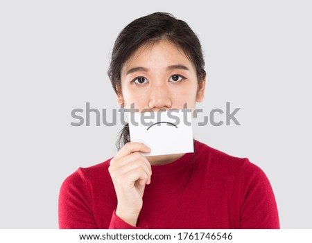 young asian woman holding happy emotion paper , advertising banner	