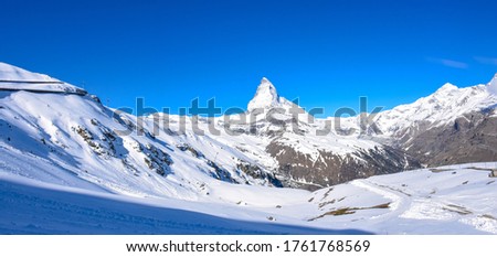 Picture of Matternhorn with white snowscape view, famous place for sightseeing and skiing Zermatt, Switzerland