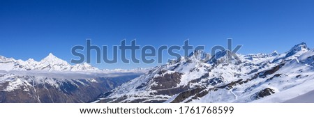 Panoramic landscape picture of beautiful Matternhorn and Swiss alpine view covered with white snow , Zermatt, Switzerland: 6/5/2019