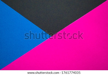 Blue, black and pink background divided diagonally