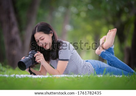 Asian woman lifestyle resting in the park, relaxation concept, mind care