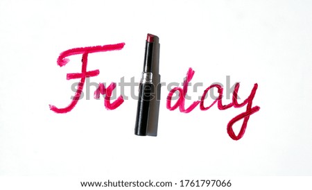 Red lipstick with Friday text, Creative concept photo of lipstick with sign friday on white background. Girls party