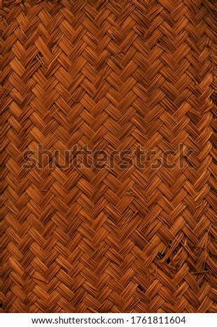 Woven dark bamboo mat texture background
