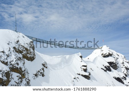 Picture of famous suspension bridge(peak walk) between two moutain peaks, tourist attraction, Glacier 3000, Switzerland: 7/5/2019