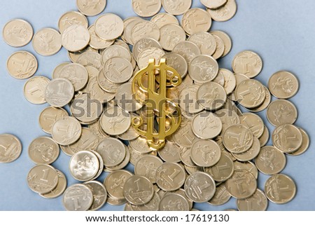 a photo of a dollar sign with small coins