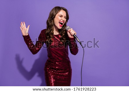 Photo of cheerful funny beautiful lady festive party dance night sing mic song vocalist singer amazing voice wear sequins burgundy dress isolated pastel violet color background Royalty-Free Stock Photo #1761928223