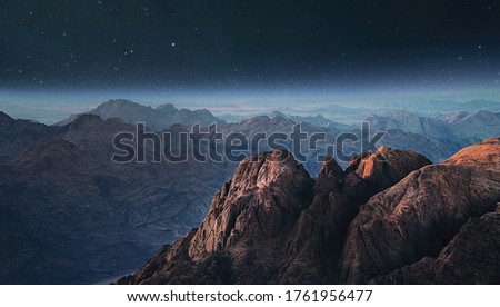 Night mountains before sunrise in the Egypt. Sinai Peninsula, the mountain of Moses. Landscape with the stars  and milky way. Royalty-Free Stock Photo #1761956477