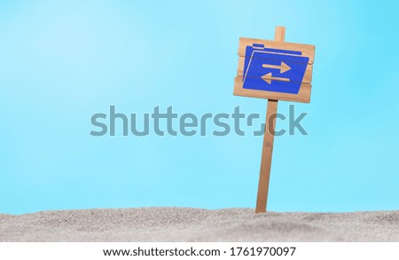 Concept of data exchange with icon on a wooden sign