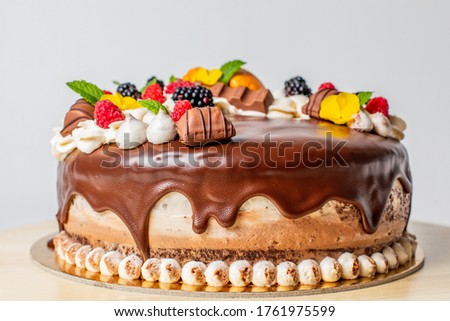 Picture of delicious chocolate cake on white