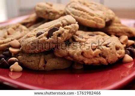 A pile of peanut butter and chocolate chip cookies