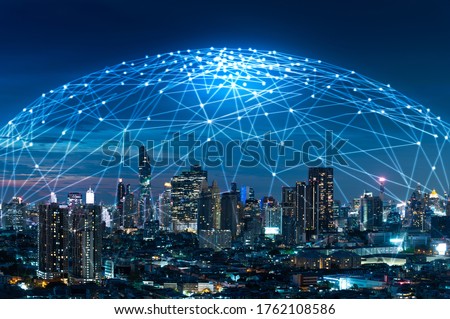 the abstract image of the cityscape image overlay with the futuristic network hologram. the concept of 5G, communication, network, connection, internet of things. Royalty-Free Stock Photo #1762108586