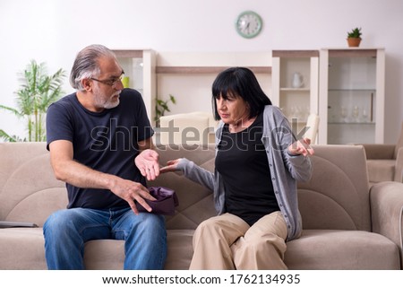 Old couple having argument at home Royalty-Free Stock Photo #1762134935