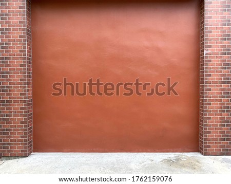 red cement concrete wall and grey floor with Brick pillar blocks look like picture frames grunge style of abstract backdrop. use in classic Loft design. living home concept with copy space. 