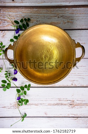 brass wok, Thai traditional cookware, used for cooking desserts or fruit preserves  Royalty-Free Stock Photo #1762182719