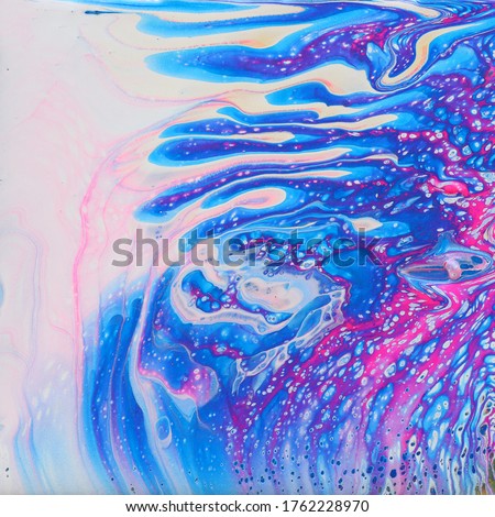 art photography of abstract marbleized effect background. Violet, white, pink and blue creative colors. Beautiful paint