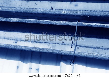 rusty metal oxide in a factory, closeup of photo