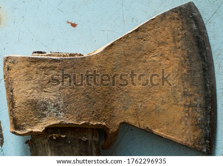Texture of an old rusty metal axe
