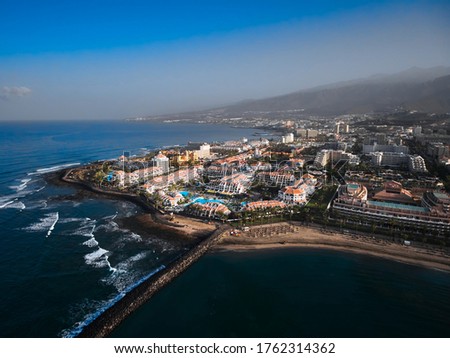 Aerial view of peninsula coastline. Big hotel resort in Playa de las Americas, 
Tenerife, Canary Islands, Spain. 