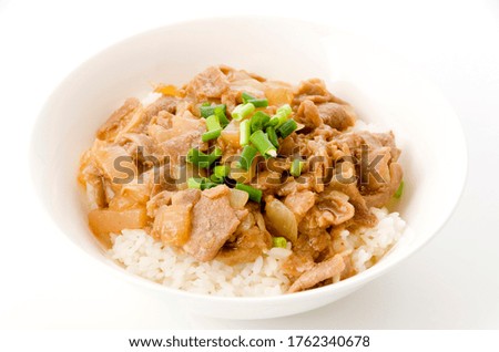 Japanese food, bowl of rice topped with pork and Konjac.