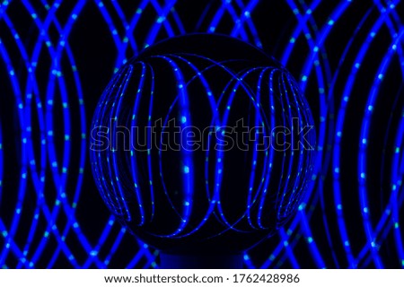 blurry texture of blue light painting on dark background
