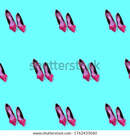 background, pattern with pink women's high heel shoes on a blue background