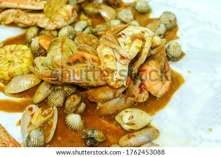 A selective picture of crab with cockle, lala and prawn insight. All seafood is serve base on people budget.