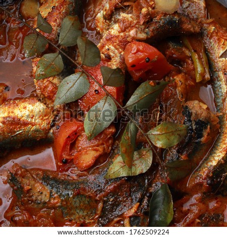 Close up of traditionally cooked Kerala style fish curry
