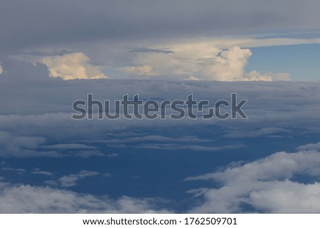 Peaceful sky with floating clouds