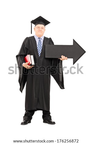 Full length portrait of a male college professor holding big black arrow pointing right isolated on white background