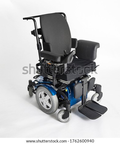 Empty electric wheel chair on white background Royalty-Free Stock Photo #1762600940