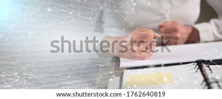Angry businesswoman hitting her desk with her clenched fist; panoramic banner
