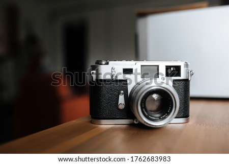 Vintage film camera on a white background. Horizontal