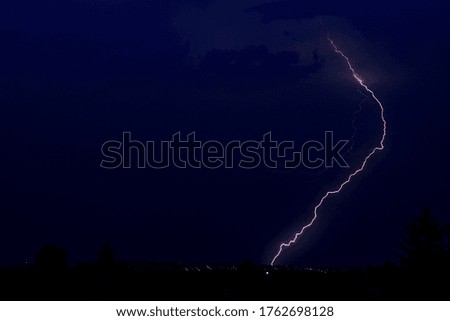 Lightning lit up the dark sky