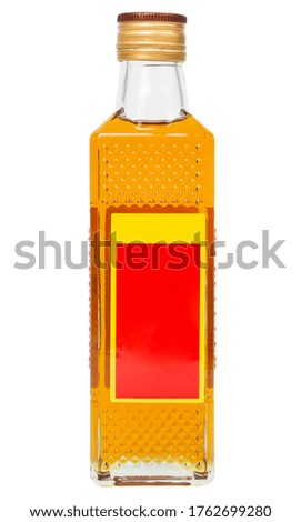 small rectangular glass bottle of yellow chinese oil isolated on white background