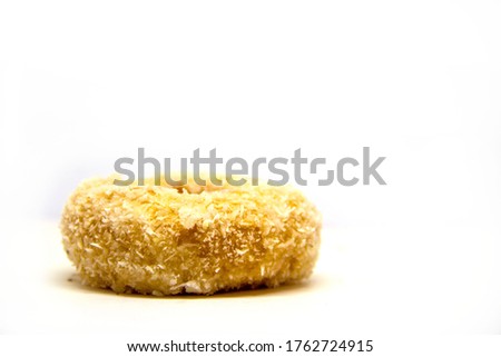 Donut ,Isolate of donut ,Donuts on top with coconut and white background, Close up of coconut  donut.