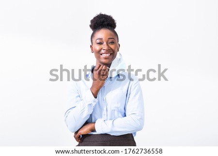 Portrait of young business woman removing face mask for protection from cold and flu and viruses. Environment protection and anti-virus concept. Woman wearing a medical mask