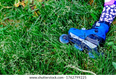 roller skates on the grass. summer picture.