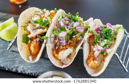 mexican fish tacos in metal tray