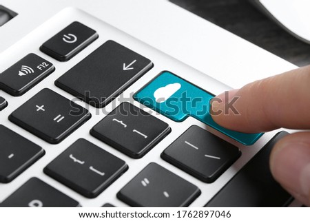 Cloud technology. Woman pressing button on laptop keyboard, closeup
