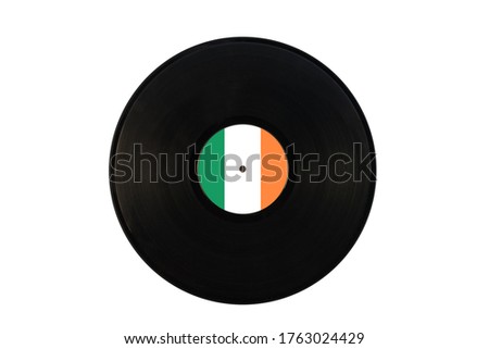 Gramophone record with the flag of Ireland. Irish music. Vinyl record with the flag of Ireland, on a white background, isolated
