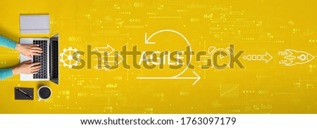 Agile concept with person using a laptop computer Royalty-Free Stock Photo #1763097179