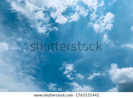 Altostratus clouds formation in a mid blue sky atmospheric beauty in nature at Bangkok, Thailand