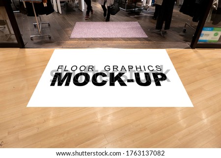 Mock up blank screen for graphic with clipping path on walkway at front of cloths showroom in shopping mall, blurred people walking, empty space for insert advertising, graphic design, information
